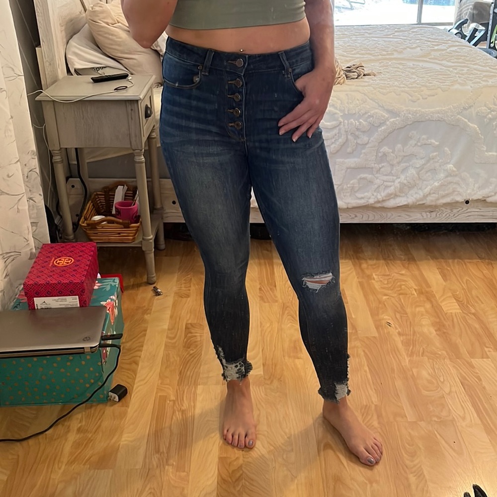 Dark wash distressed skinny jean